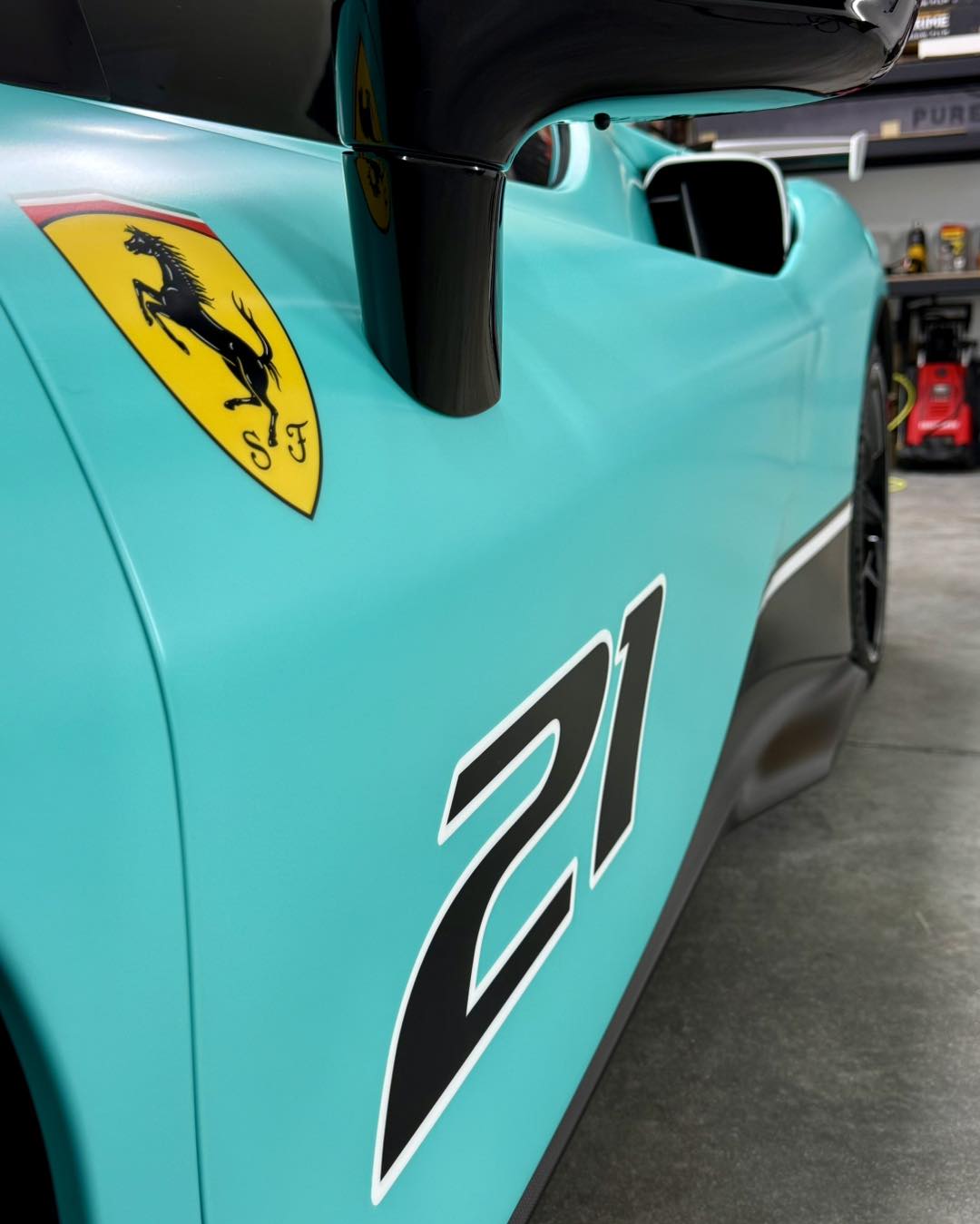 Teal hypercar after a full exterior detail