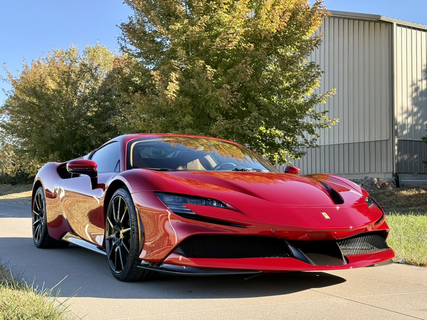 Red sports car with a freshly polished glossy finish